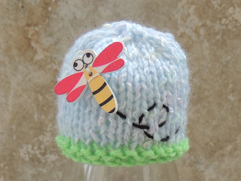 Dragonfly button Innocent Smoothie hat pattern link