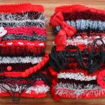 Knitted-twiddlemuff-red-wools