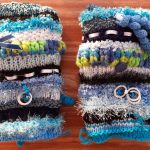 Knitted-twiddlemuff-turquoise-wools