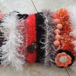 Twiddlemuff-knitted-different-red-wools